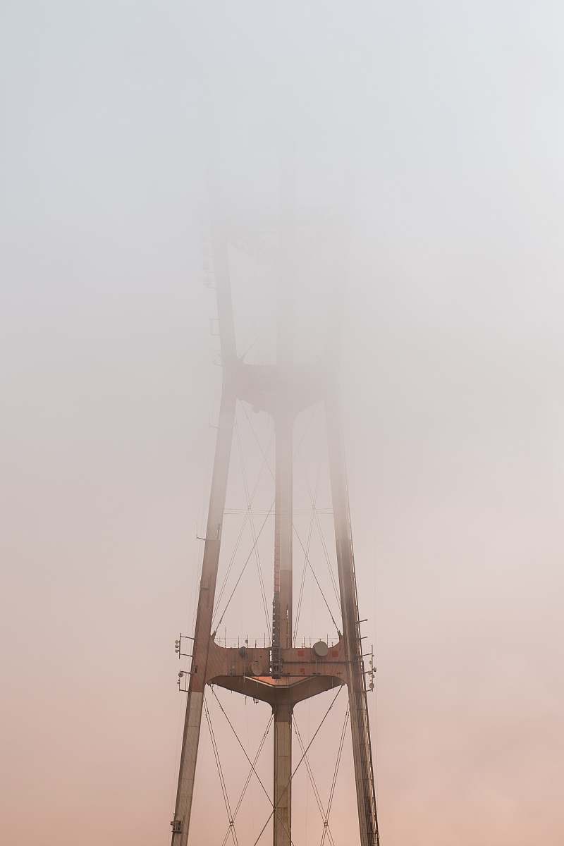 twin peaks gray network tower covered by white clouds san francisco